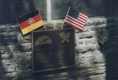 Bronze plaque at Kesternich, near Simmerath, Germany, honoring U. S. 78th Infantry Division and the German 272nd Volksgenadier Division. Between Dec. 16-22, 1945, Kesternich was captured twice and lost twice from and by the 272nd Division.